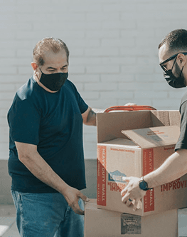 Workers handling packages